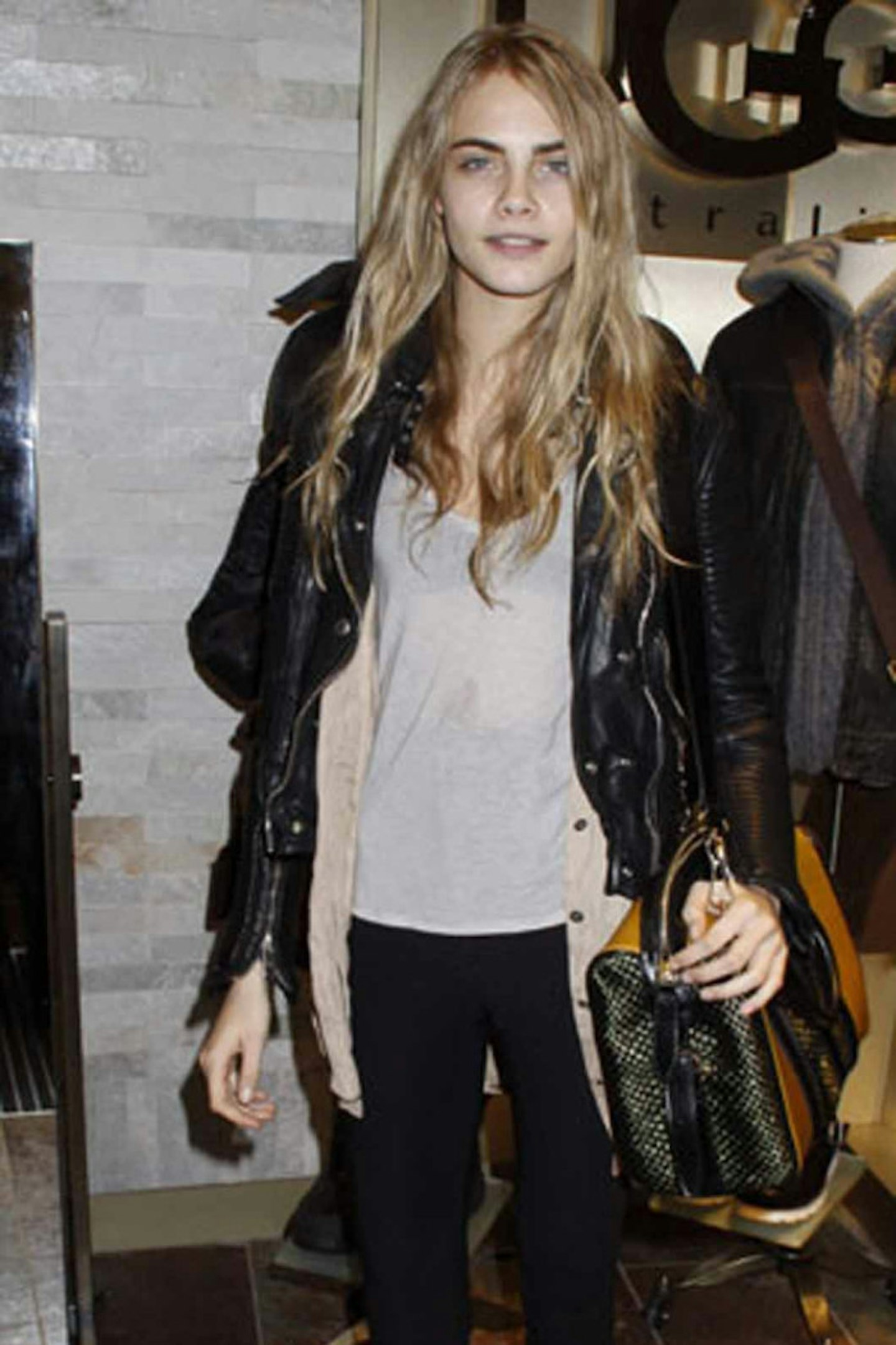 Cara Delevingne style black leather jacket skinny jeans boots